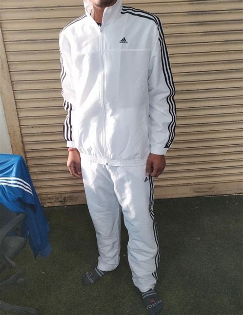 full white tracksuit.